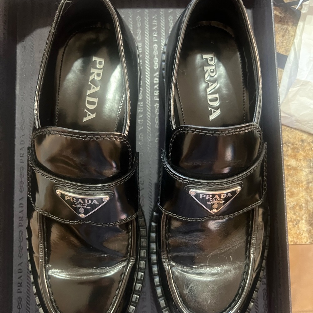 Prada Black Leather Slip-On Loafers with Polished Finish